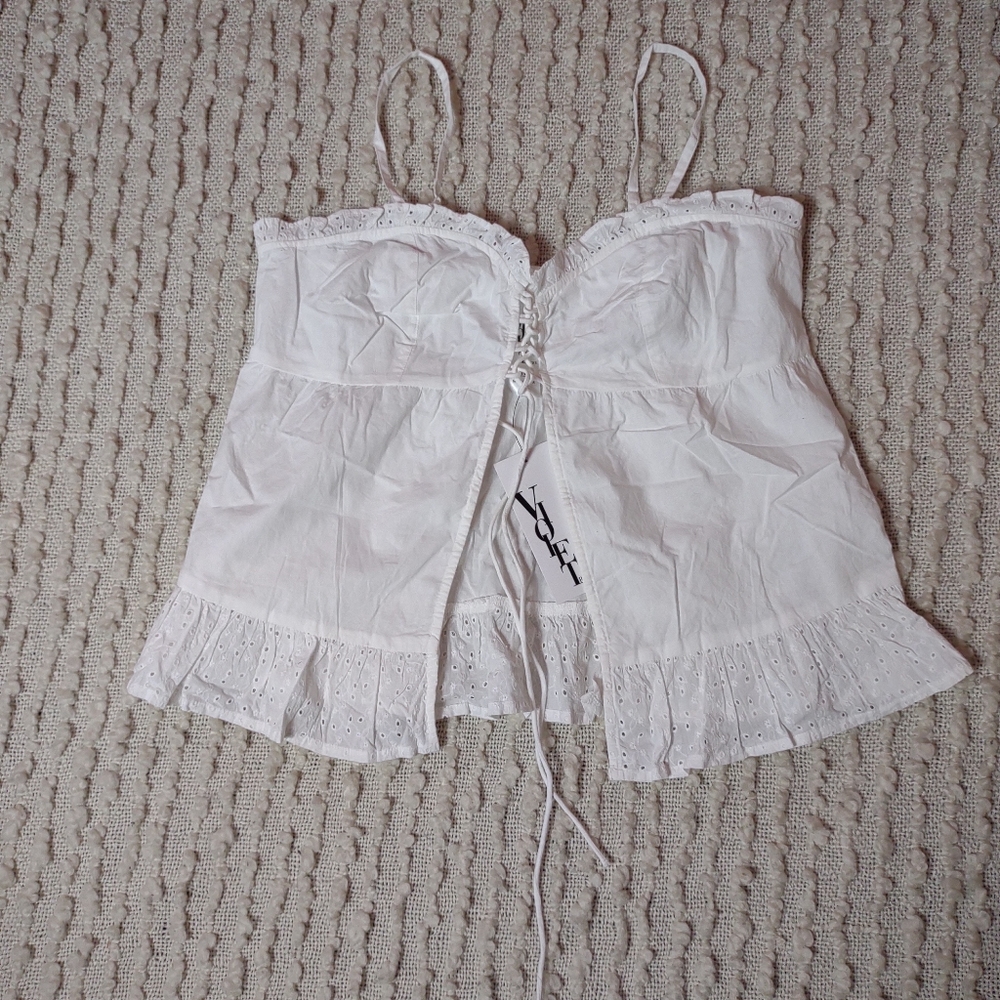 Eyelet ruffle lace front top